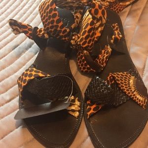 Custom made African fabric and leathet